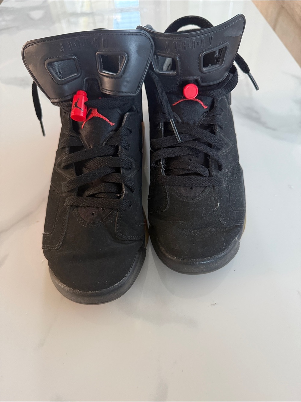 Jordan Kids Black Sneakers with Red Jumpman Accents and Lace Toggles